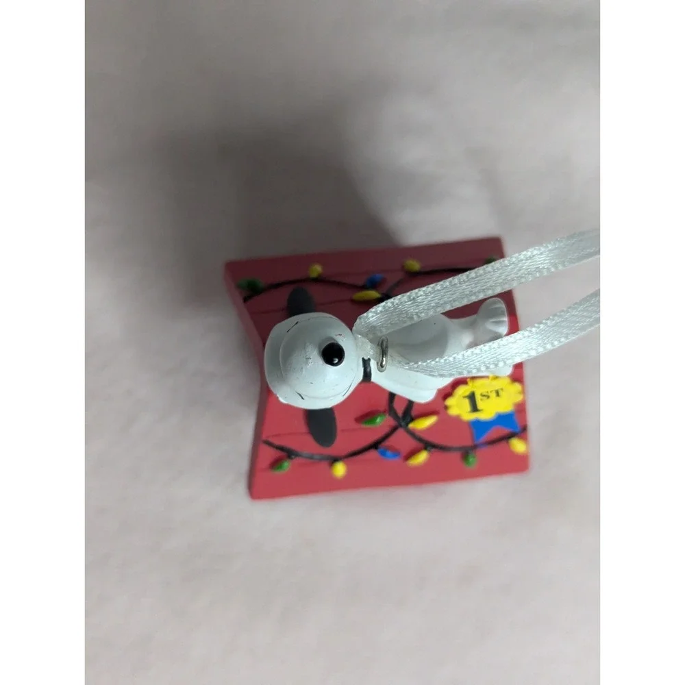 Peanuts Worldwide Snoopy on top 1st place Christmas‎ Decorated doghouse ornament